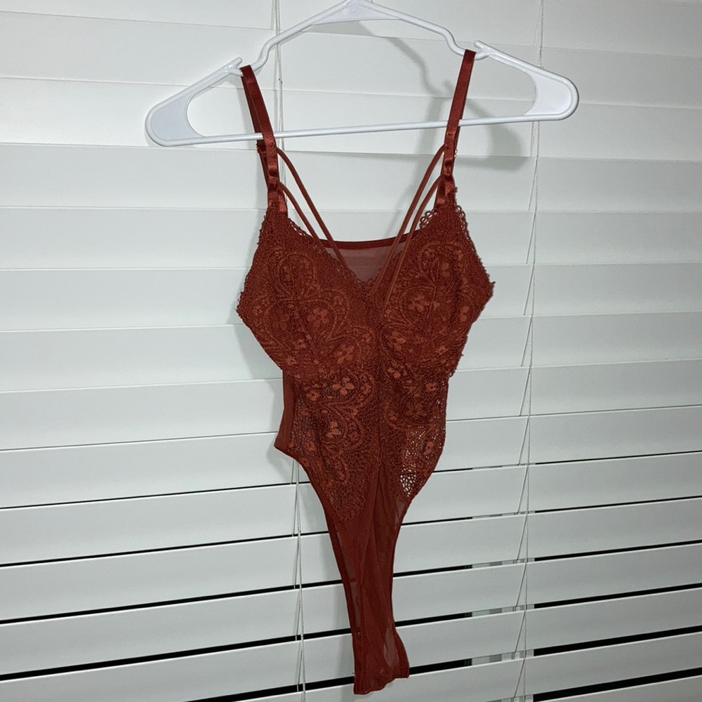 Women’s Lacey sheer bodysuit